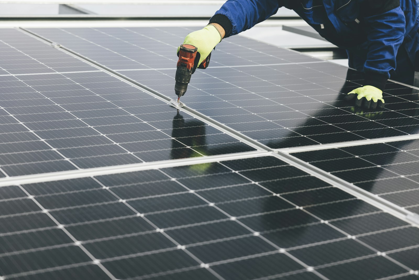 Engineer installing solar panels